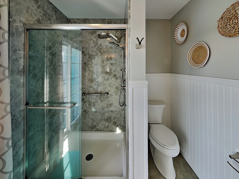 Blue Me A Wave by Topsail Realty
