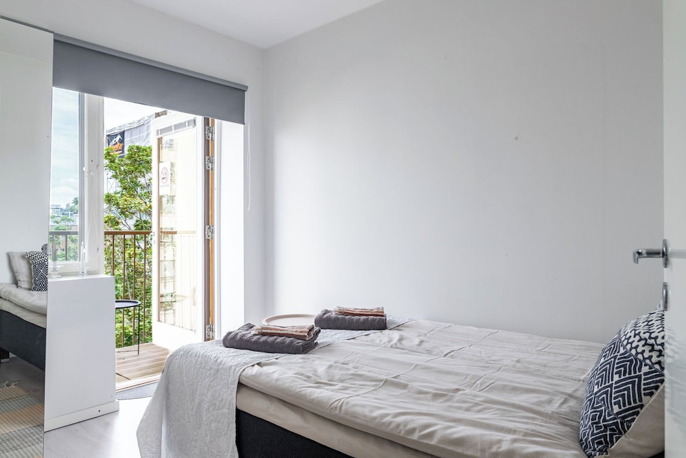 Modern 1BR Home with Sauna & Balcony