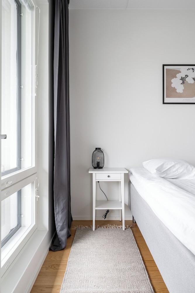 Modern 2BR Apartment with Sauna & Large Balcony
