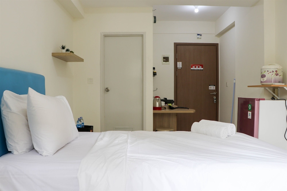 Warm and Nice Studio at Podomoro Golf View Apartment