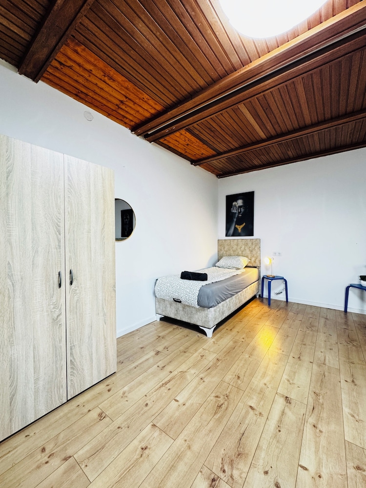 Central 8BR Stay with Garden and Terrace