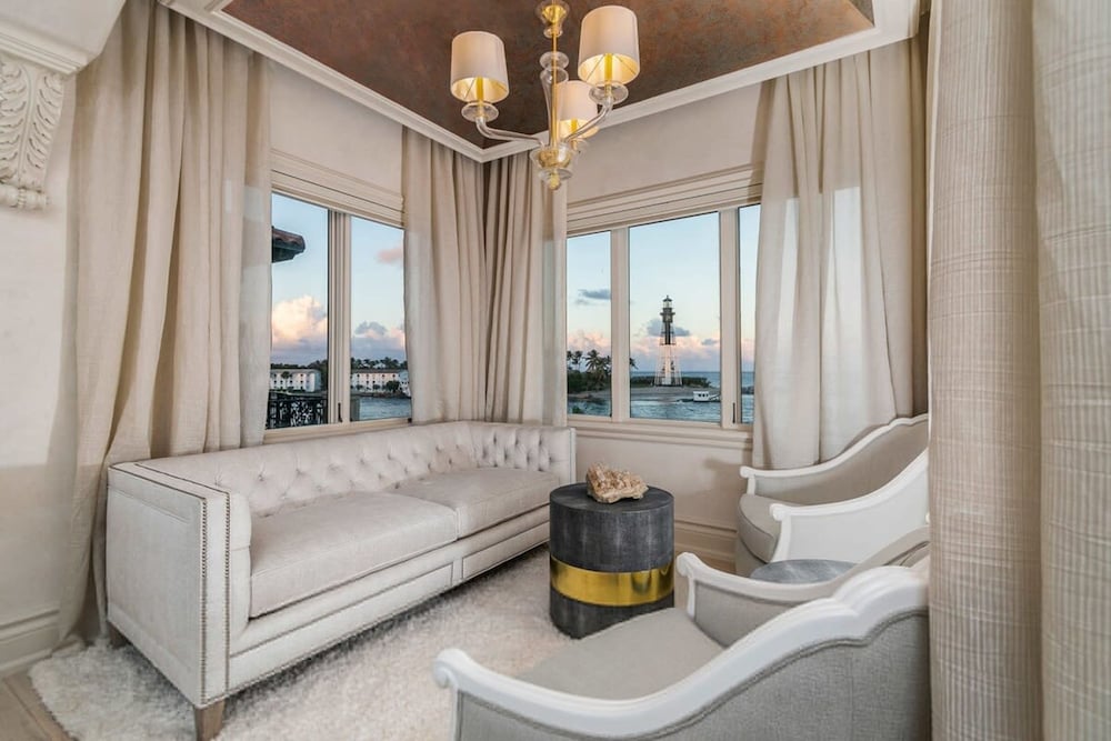 Luxurious 3-story Estate With Gym Pool Slide Private Beach and Lighthouse Views