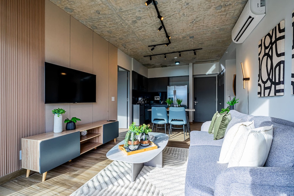 w Elegant 2BR Apartment in the Heart of Centriqo