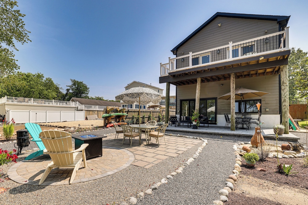 Dock + Backyard Bar: Spacious Barnegat Bay Retreat