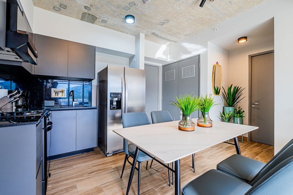w Elegant 2BR Apartment in the Heart of Centriqo
