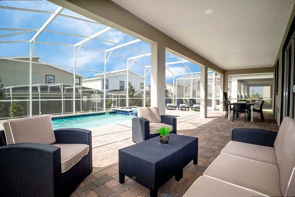 Spacious 7BR w Pool Spa Game Room Near Disney