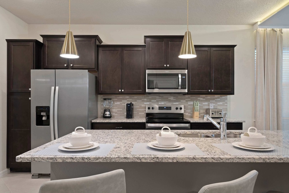 Luxurious Windsor Cay Villa Private Pool, Epic Game Room & Minutes to Disney!