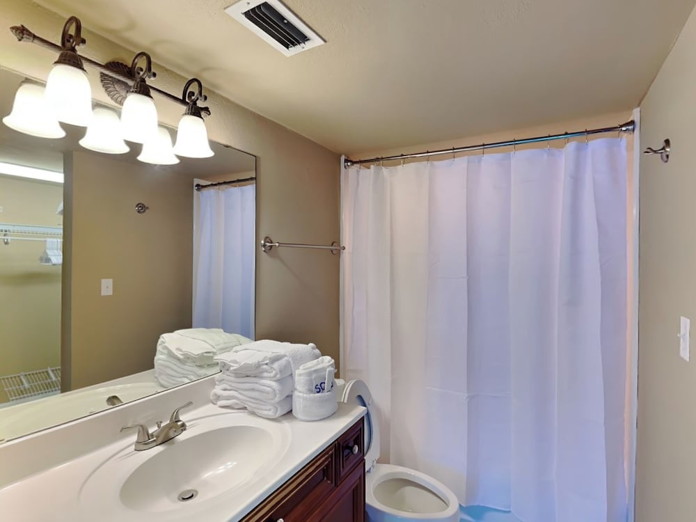 Sabine Yacht & Racquet #8D by Southern Vacation Rentals