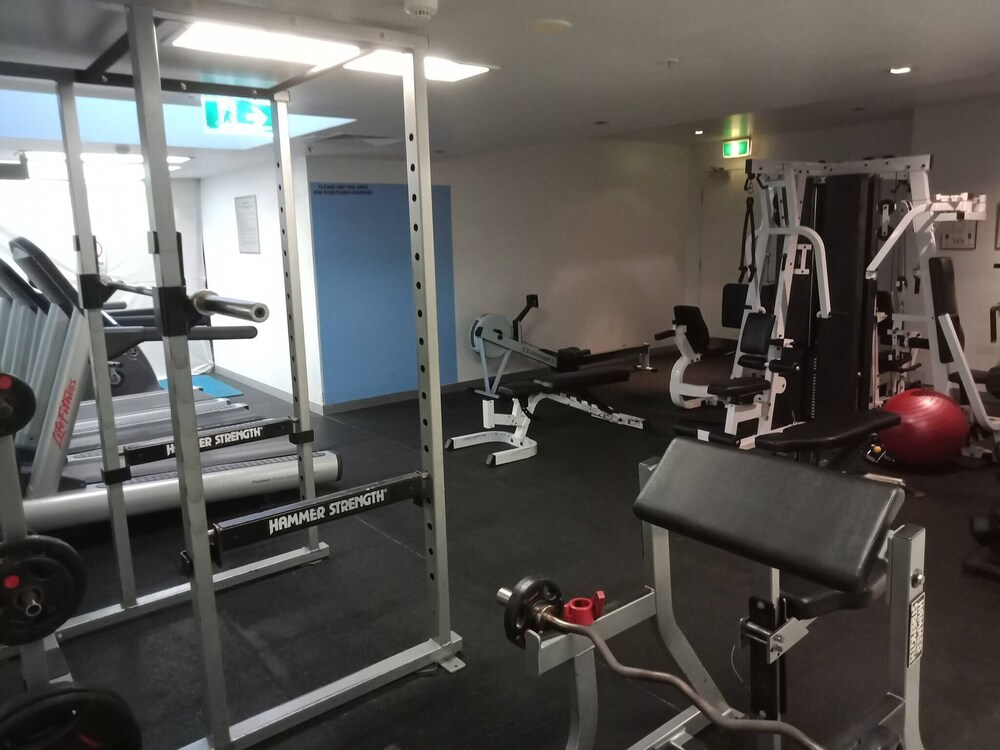 Unwind in Style at Melbourne's Historic Art Deco Apartment With Pool Gym Carpark