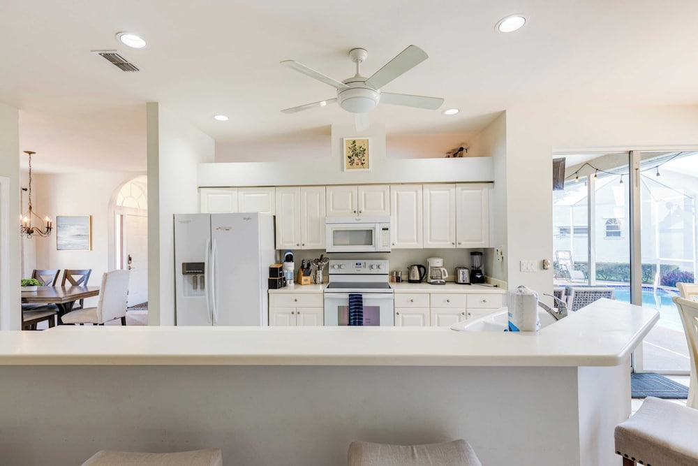 Private Pool, Pond Views, & Bonus Lounge in Gated Naples Community Drive to Dining & Sand