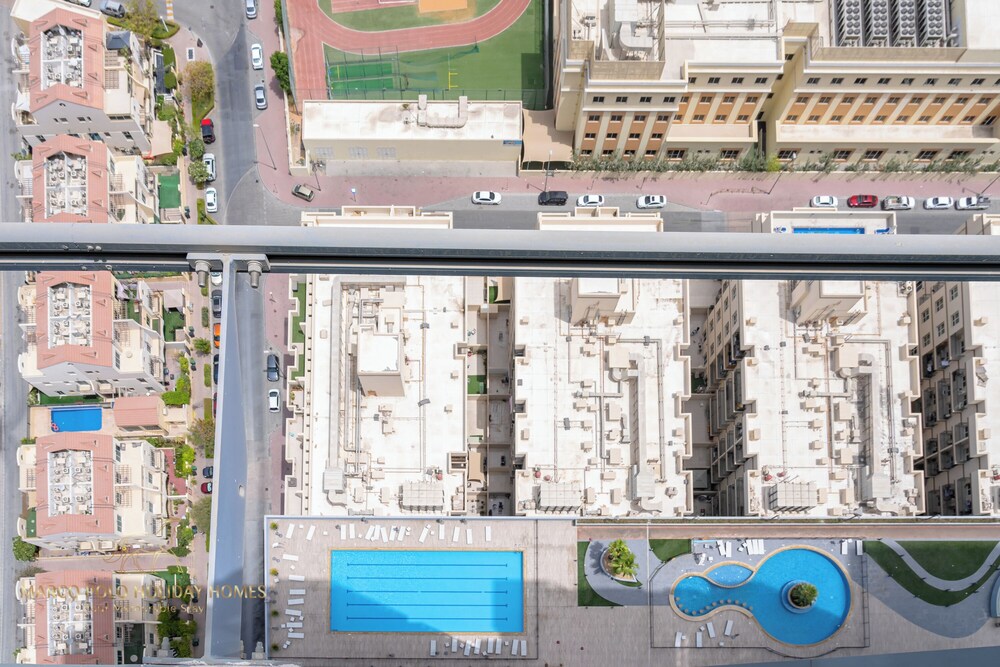 Marco Polo - Spacey Studio With Balcony at JVC | Pool & Gym