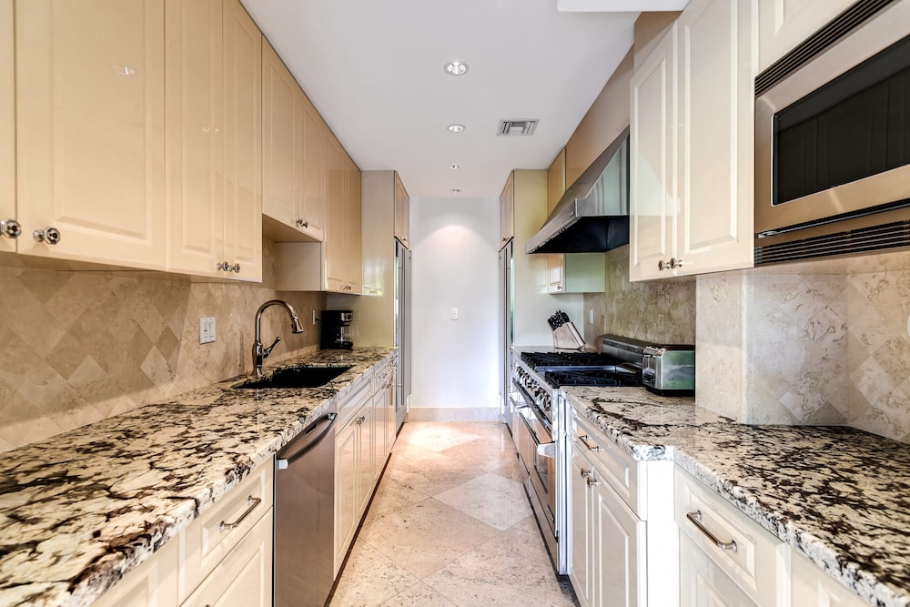 Waterfront Mansion With Game Room Gym Media Room and Guest House