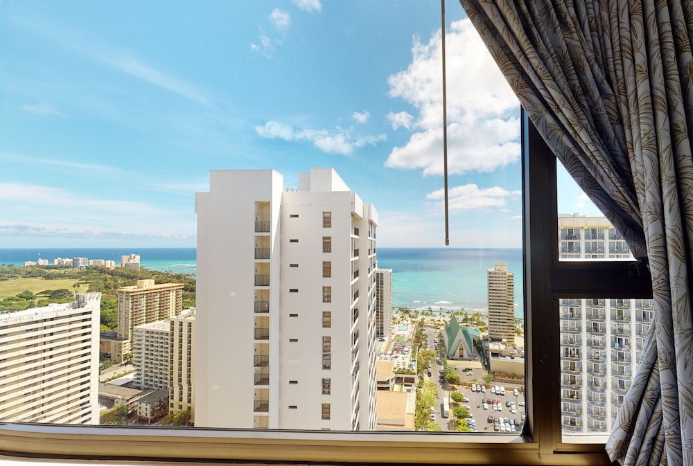 Waikiki Banyan Condo Located One Block From Waikiki Beach! by Koko Resort Vacation Rentals