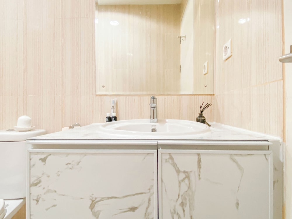 Warm and Cozy 1BR without Living Room at Sentul Tower Apartment