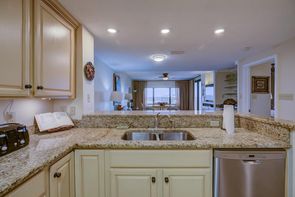 Stunning Ground Floor Condo With Lush Lawn Overlooking White Sands view 5