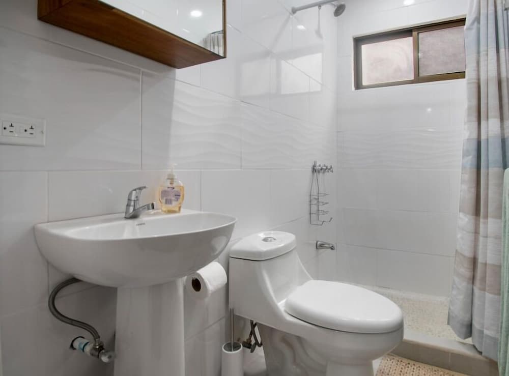 Minimalist Condo with a Beautiful New Design, Enclosed Patio, and Shared Community Pool