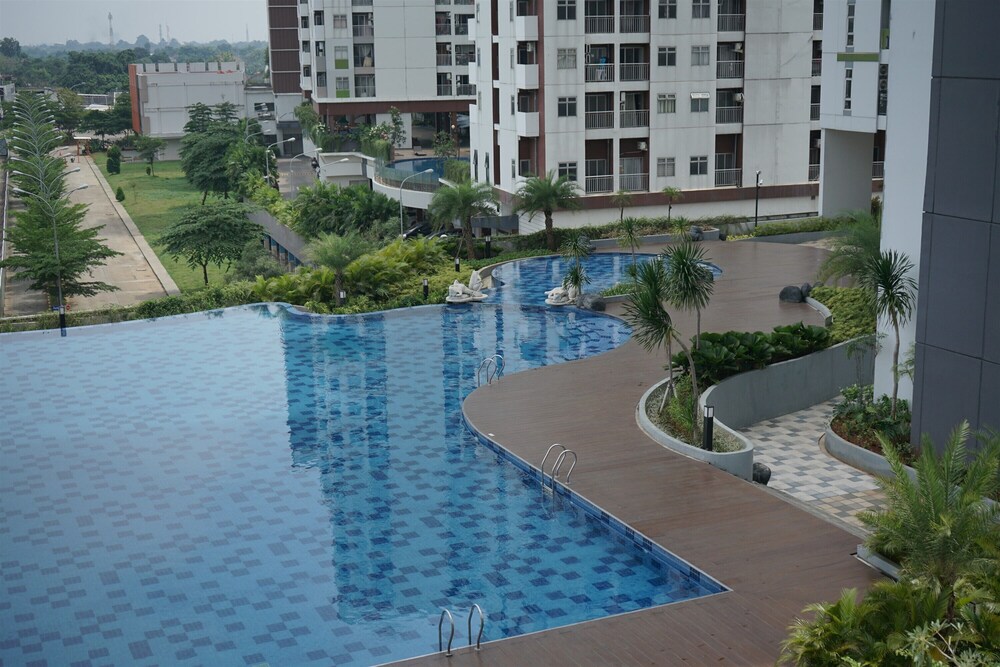 Homey Studio Room At Akasa Pure Living Bsd Apartment
