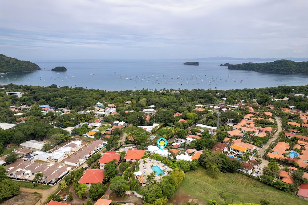 Modern Top-Floor Condo with Panoramic Views and Community Pool