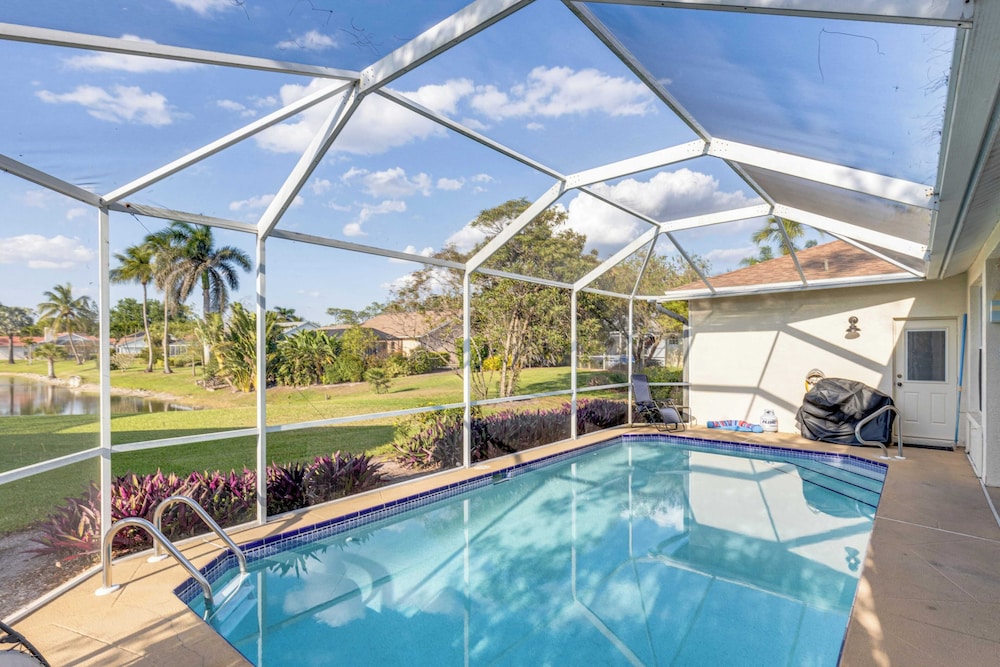 Private Pool, Pond Views, & Bonus Lounge in Gated Naples Community Drive to Dining & Sand