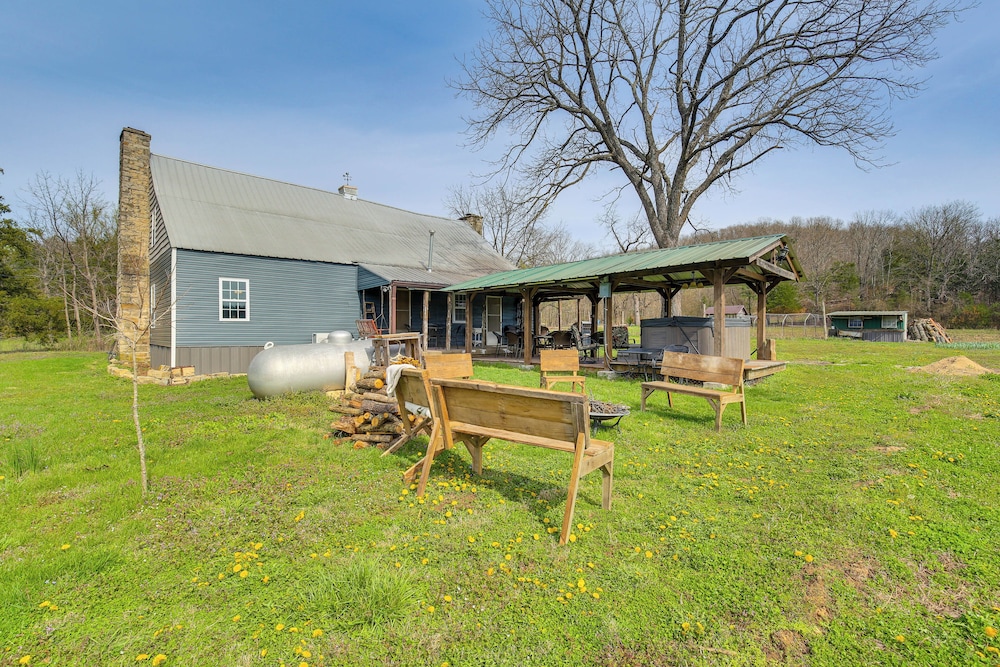 Hot Tub & Creek Views: Secluded Perryville Cabin