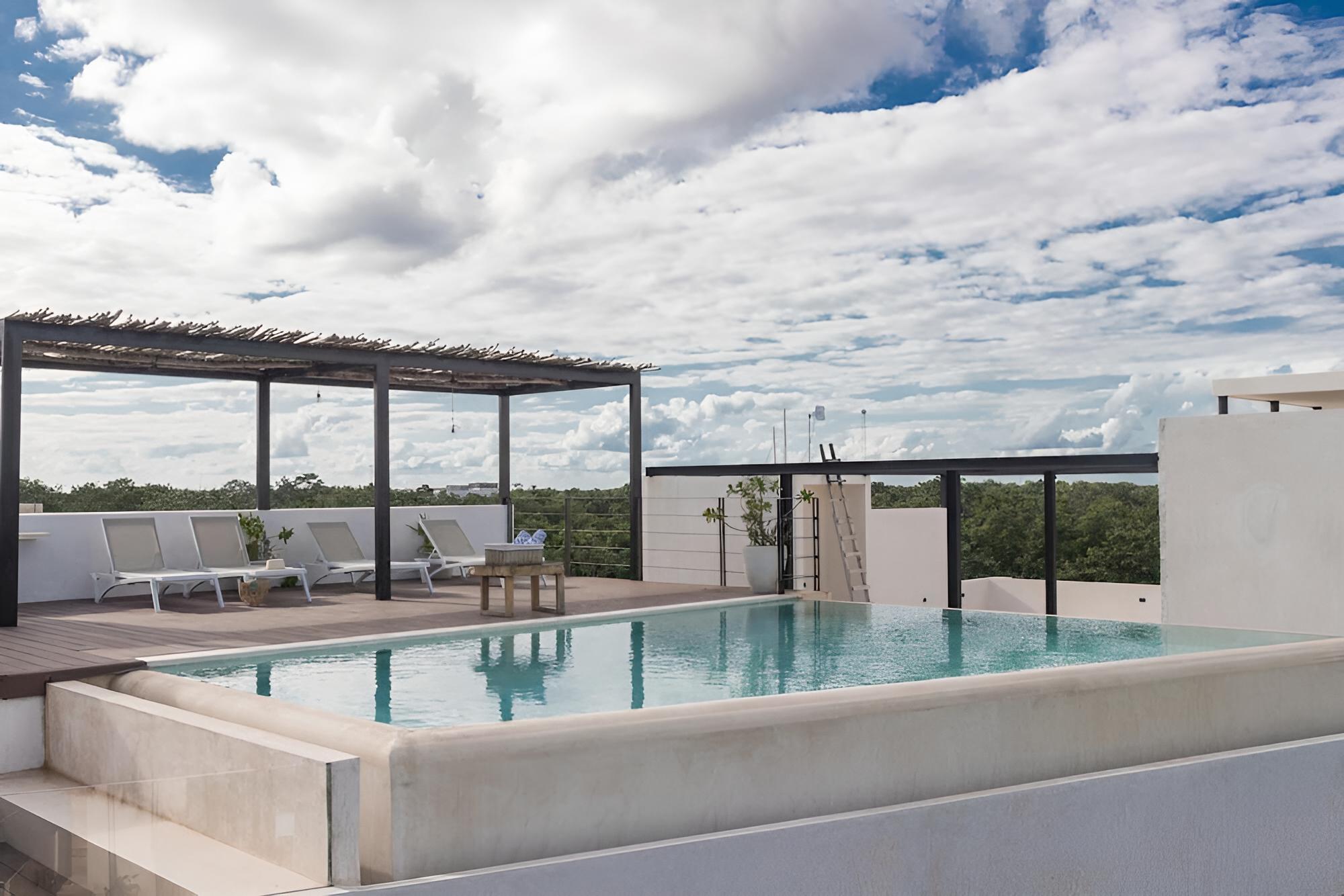 Trendy Tulum Escape Condo Breathtaking View From Rooftop Terrace Infinity Pool Great Decor view 5