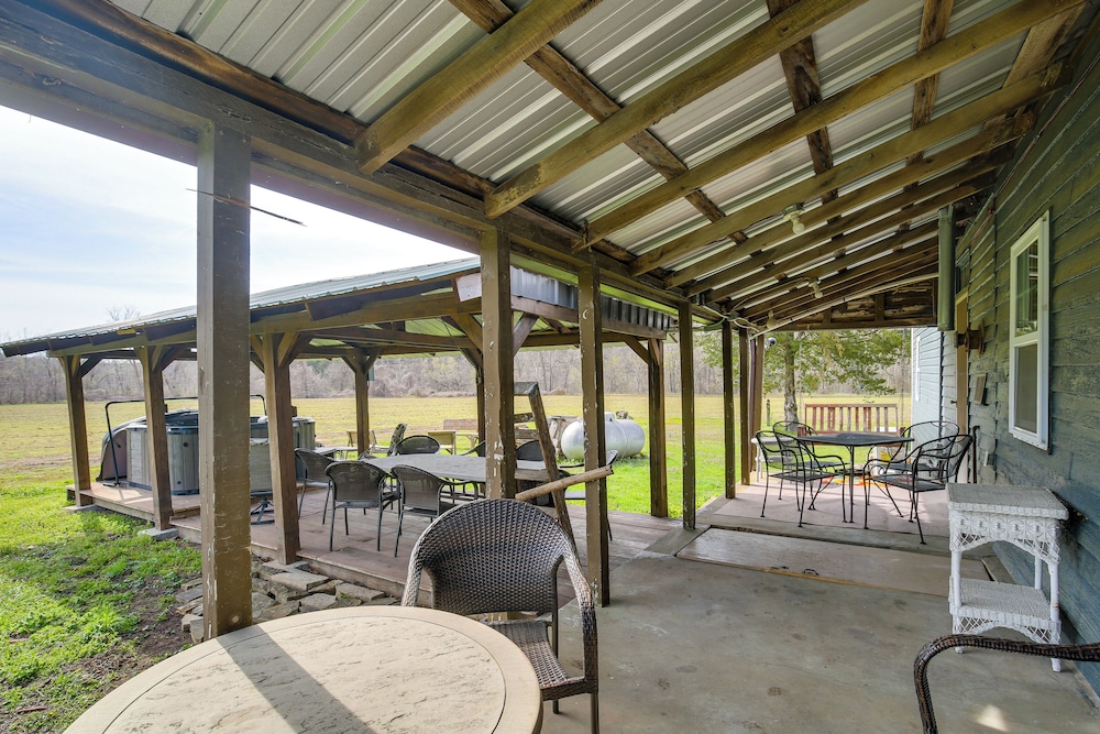Hot Tub & Creek Views: Secluded Perryville Cabin