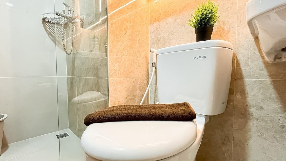 Earth Tone Studio Apartment At Transpark Bintaro