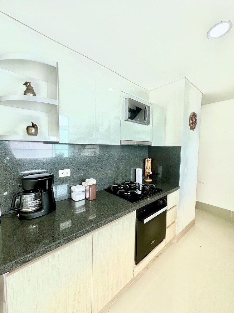 by Calamari Homes - Edificio Murano Elite