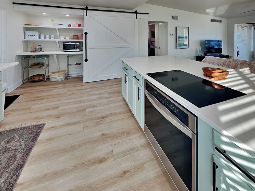 Bathing Suit Beach Bungalow by Distinctive Beach Rentals