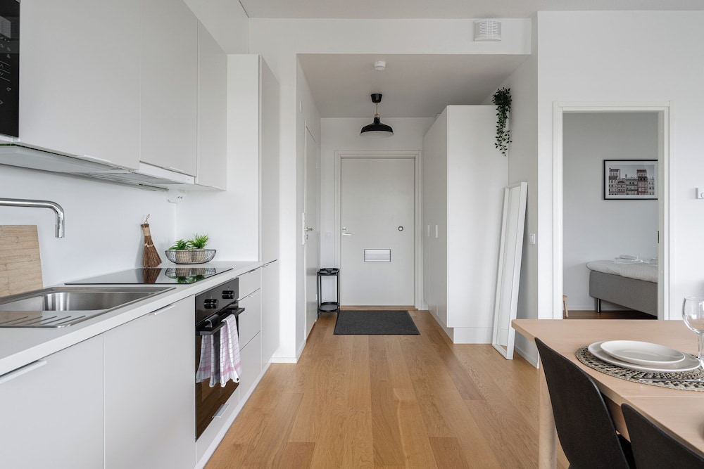 Modern 2BR Apartment with Sauna & Large Balcony