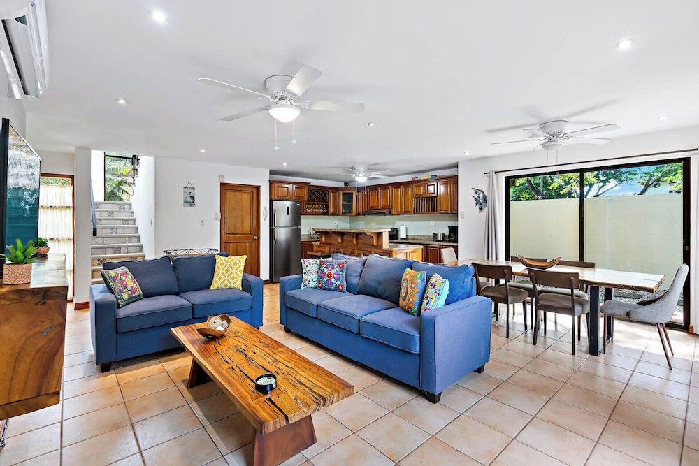 Inviting Home with Colorful Decor and Private Backyard Oasis with a Swimming Pool & Shaded Terrace