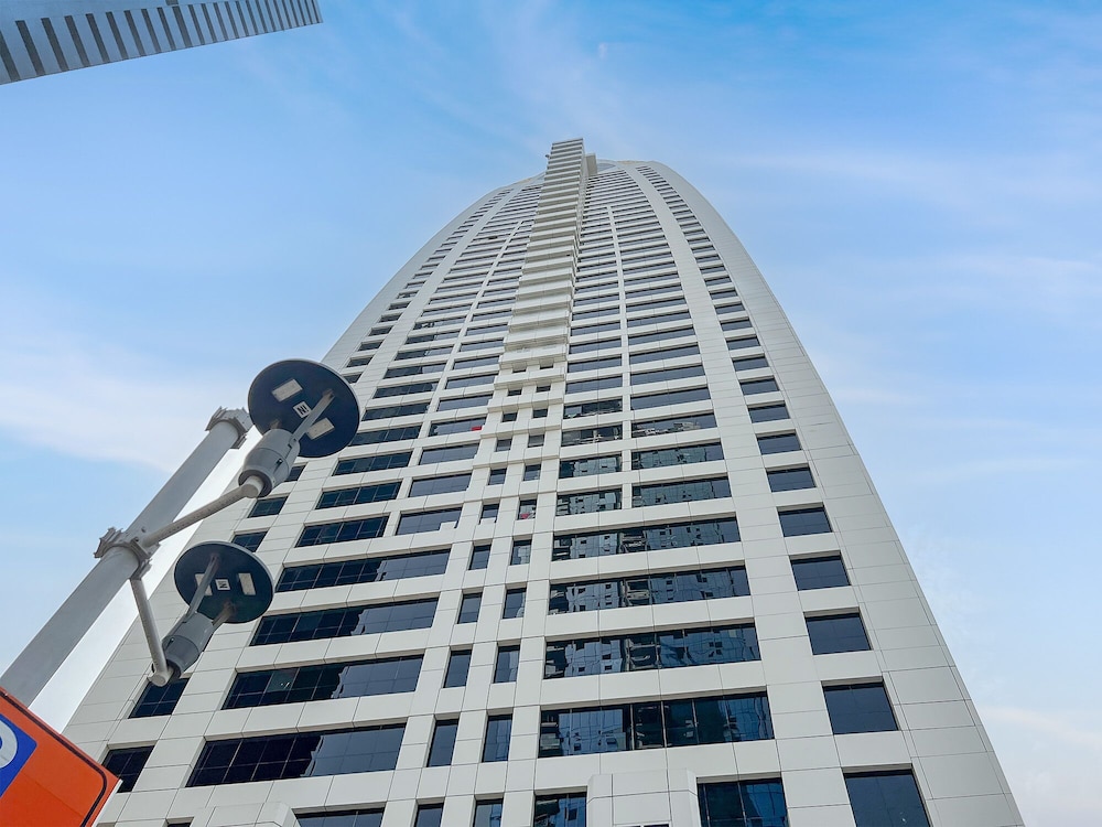 Cosmos Living Dubai Arch Tower