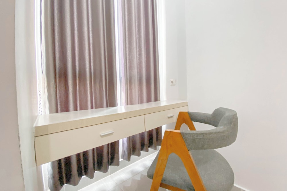 Simple White Studio Apartment At The Alton Semarang