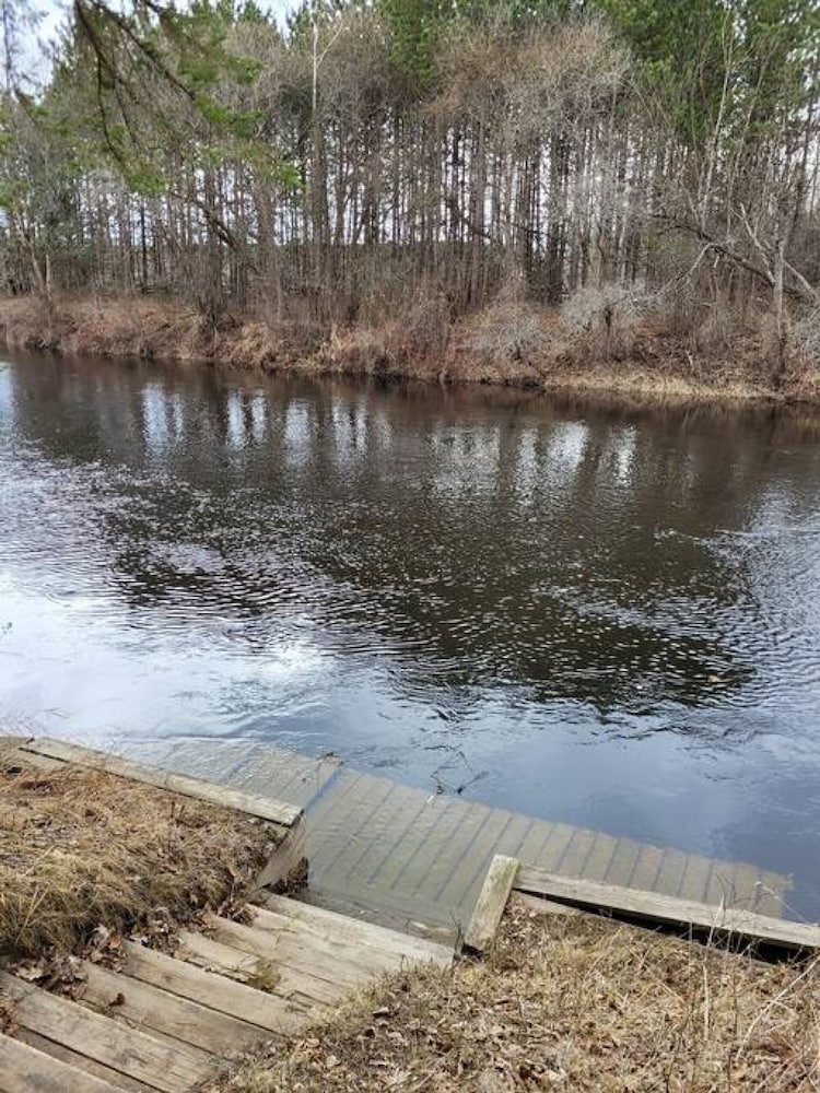 Whispering Pines Riverside Getaway