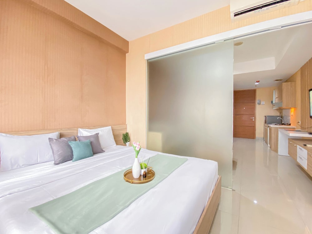 Homey and Comfortable 1BR Apartment at Dago Suites