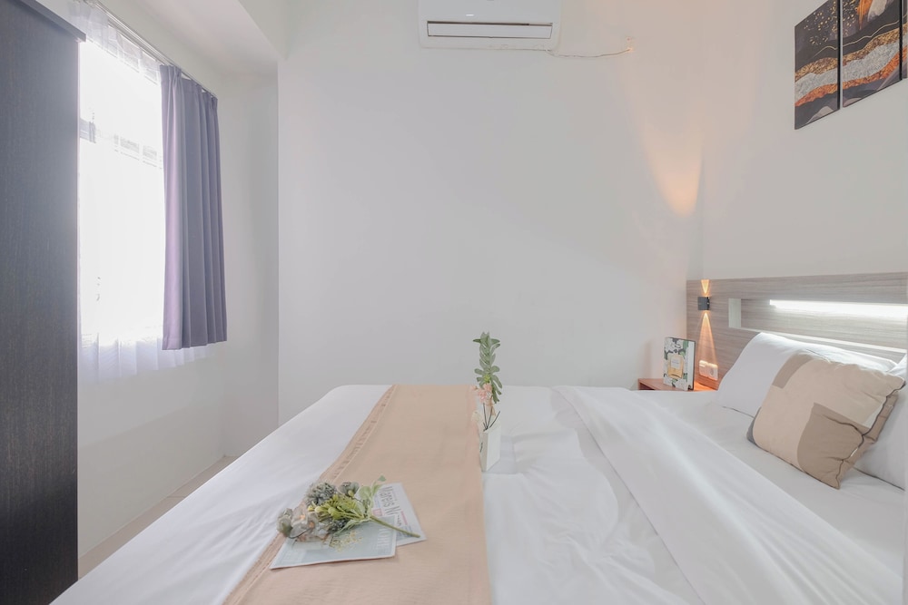 Minimalist and Well Designed 2BR Apartment with Extra Room at Vittoria Residence