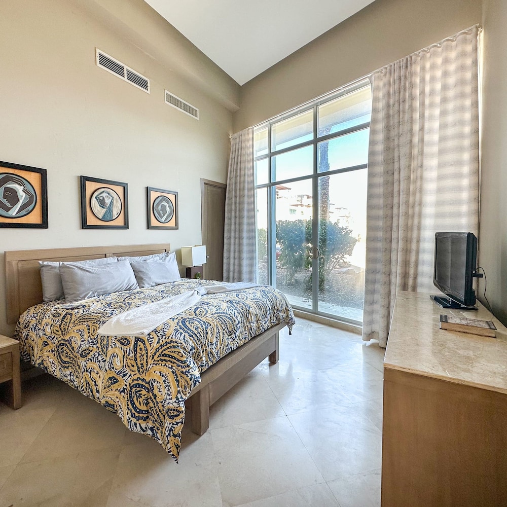 Splash Into Style Ground Floor Poolside Condo