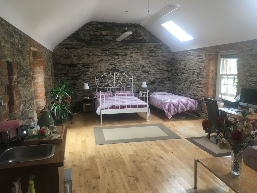 Period Coachhouse on organic farm view 2