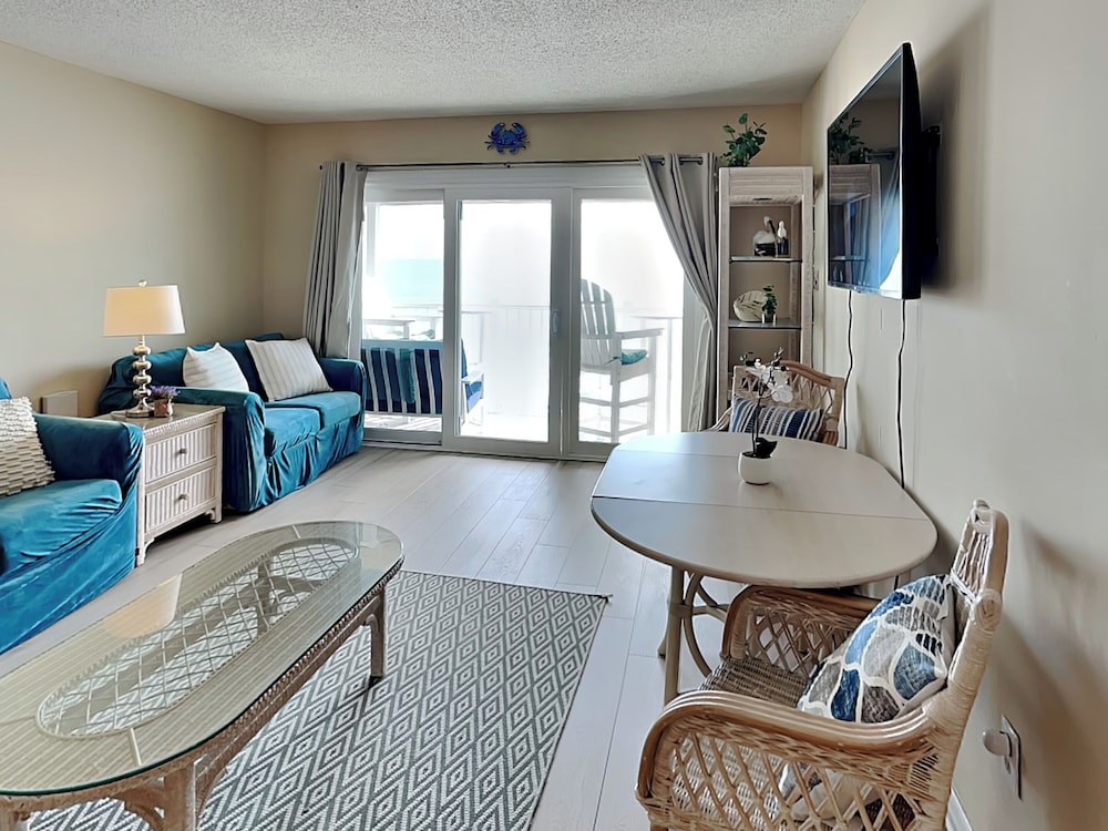 A Wave From It All by Topsail Realty