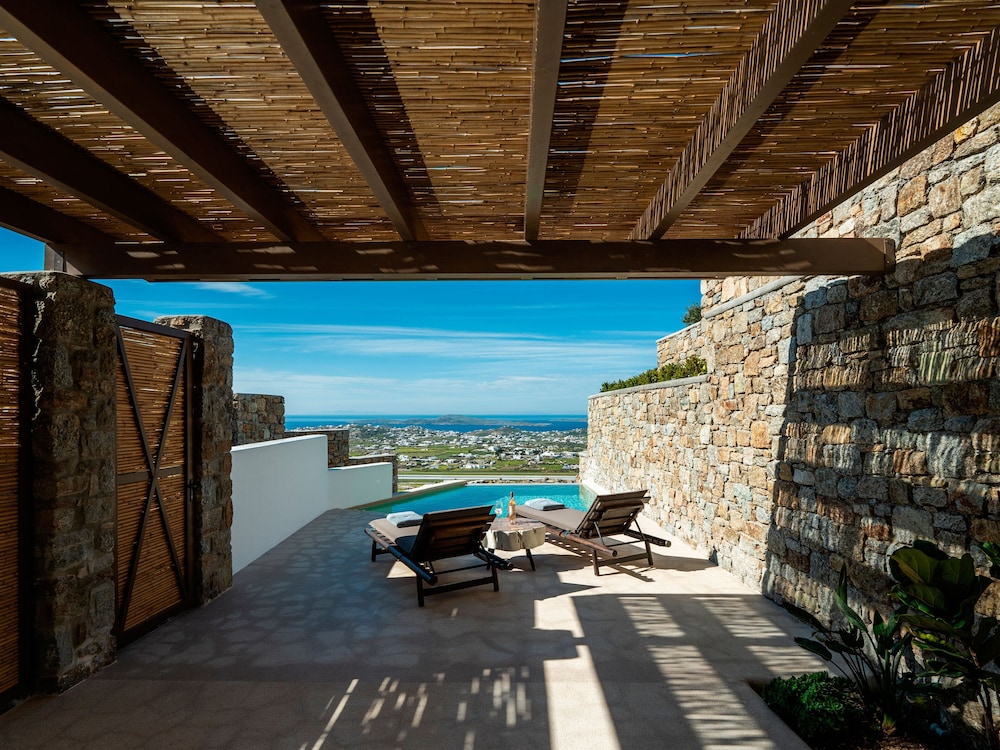 Kounoupas Complex by Mykonos Rocks