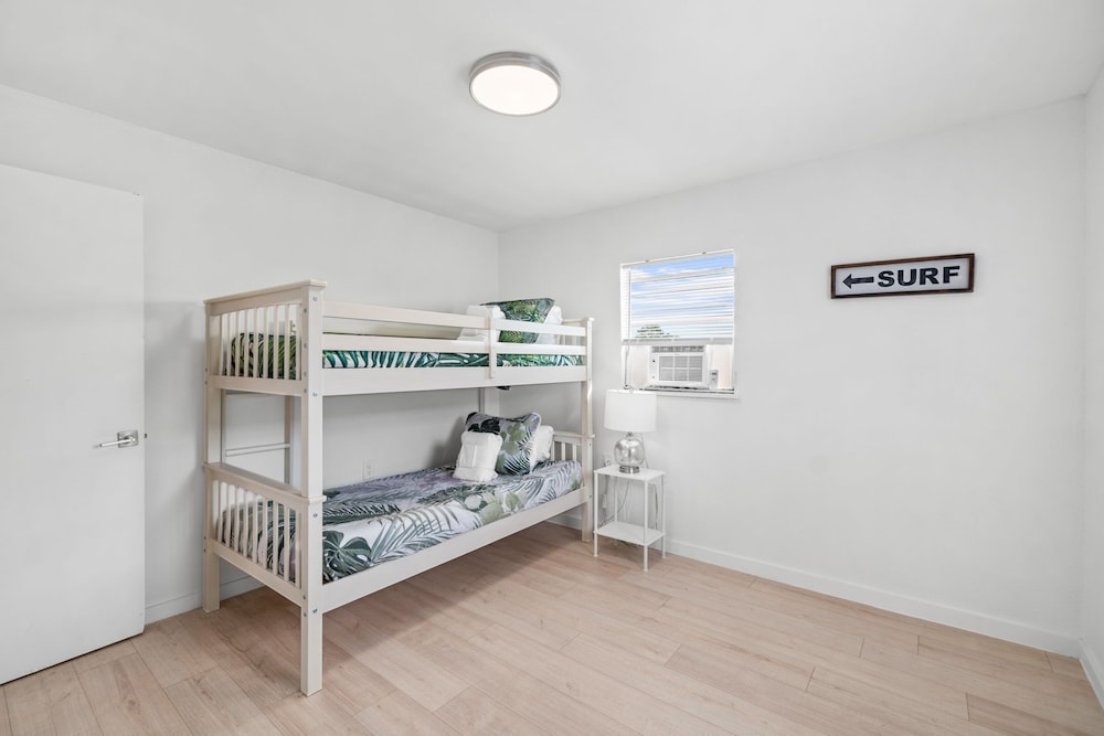 The Beach Bungalow by Book That Condo
