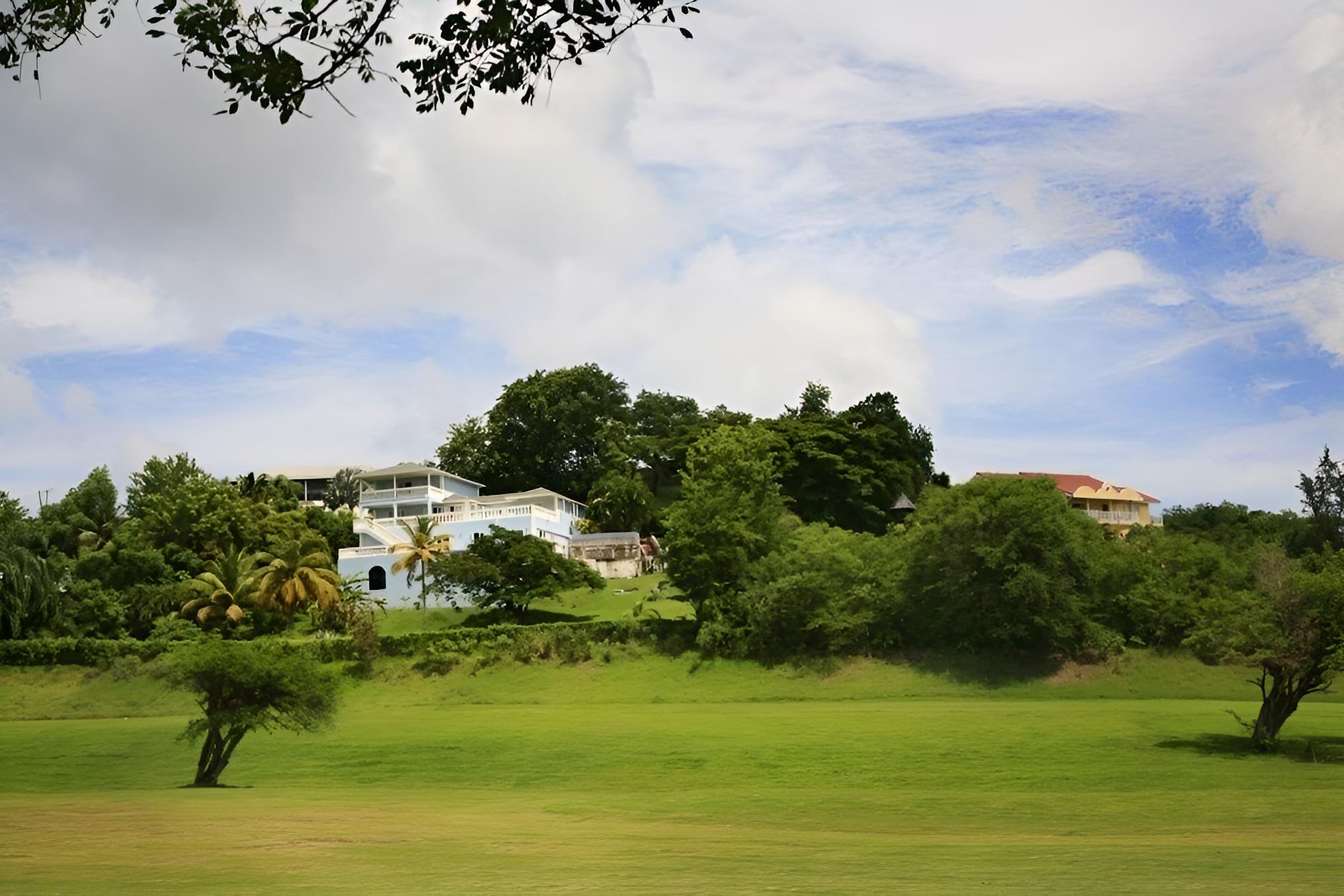 Fairway And Ocean Views - Blue Moon 4 Bedroom Villa by RedAwning
