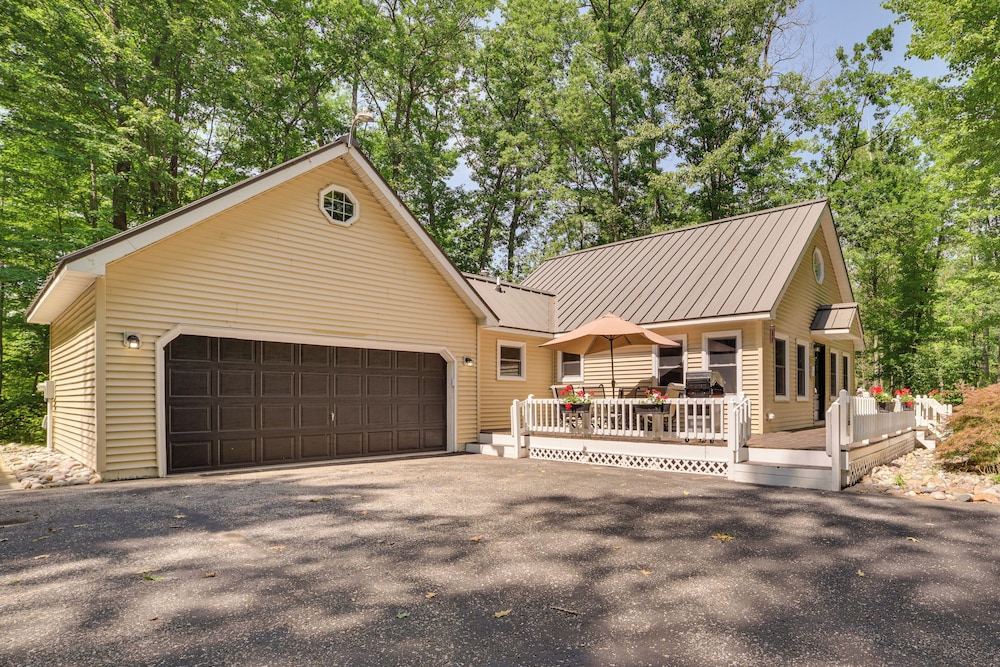 Dock Access + Nearby Beach: Higgins Lake Retreat!
