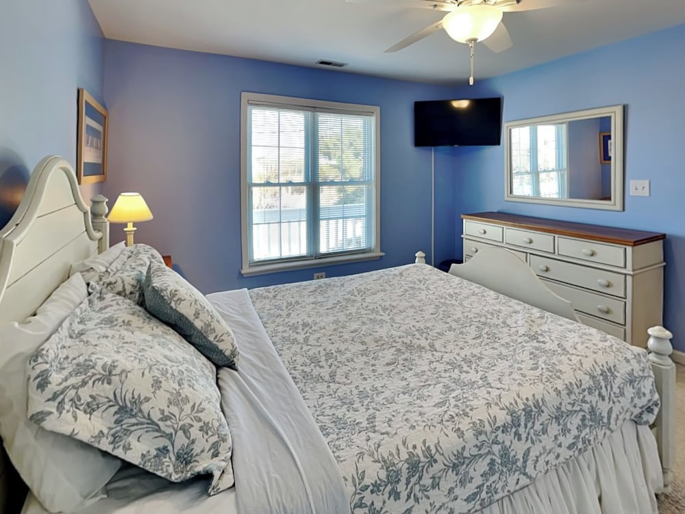 A Charm of Finches by Topsail Realty