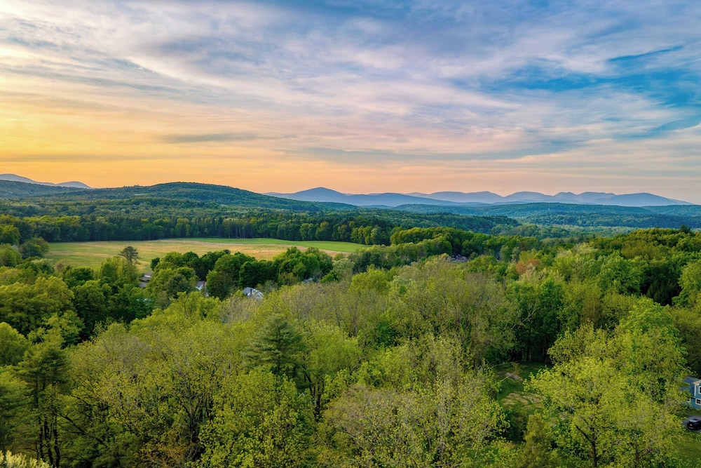 Relax in Style at Historic Modern on Main With Modern Amenities & Wooded Views