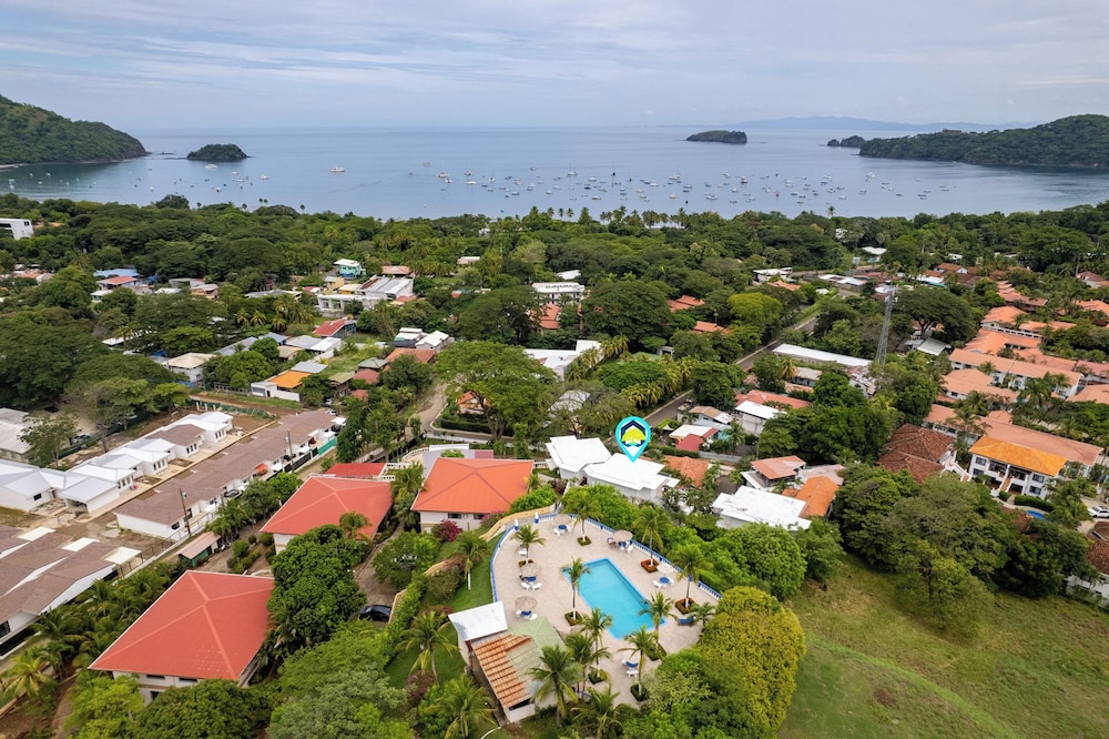 Modern Top-Floor Condo with Panoramic Views and Community Pool