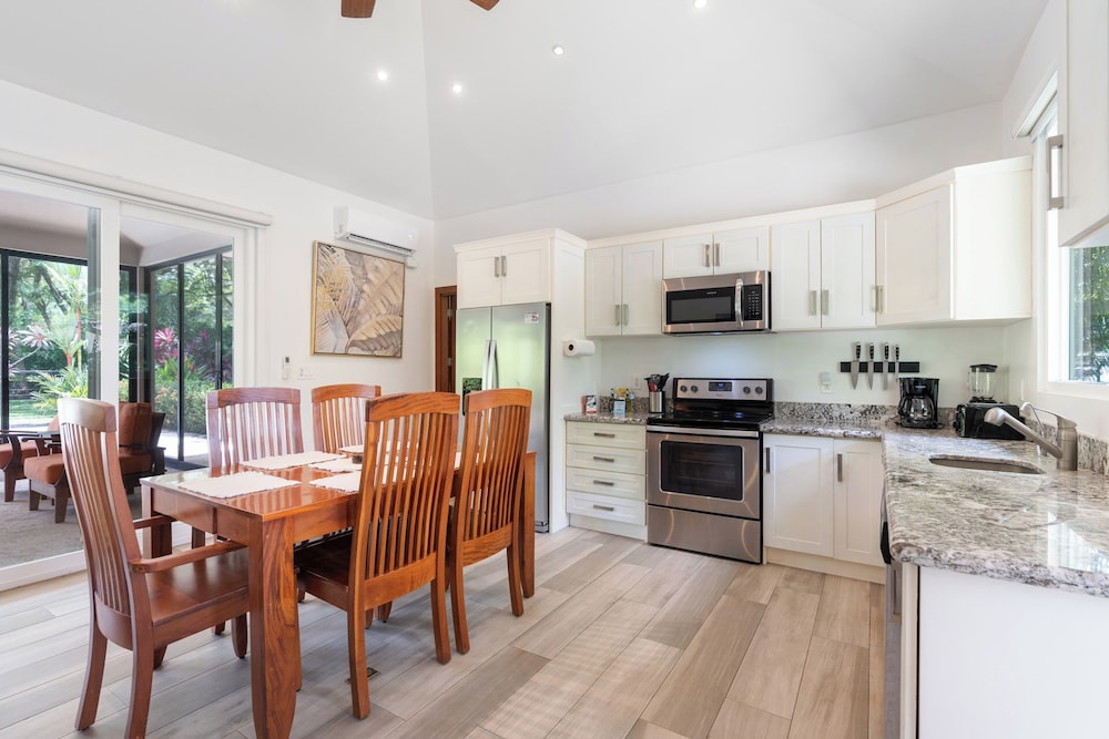Beautiful home in a gated Neighborhood, Walking Distance to Beach with Garden