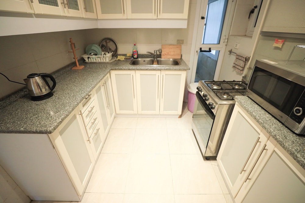 Ivory Petal Bliss 2BR Apt