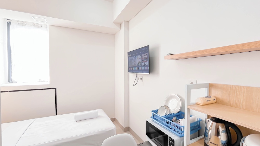 Comfortable Studio Room (No Kitchen) at Bandaraya - Tallasa City Makassar Apartment