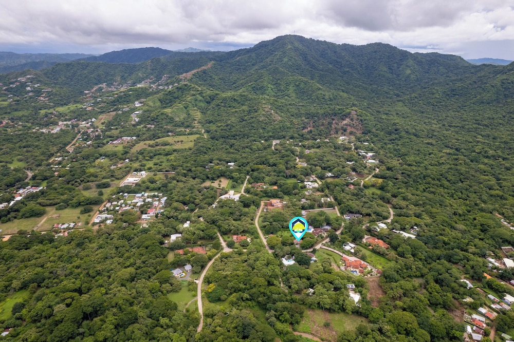 Beautiful home in a gated Neighborhood, Walking Distance to Beach with Garden